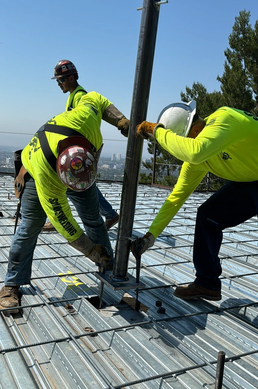 installing steel pole rooftop
